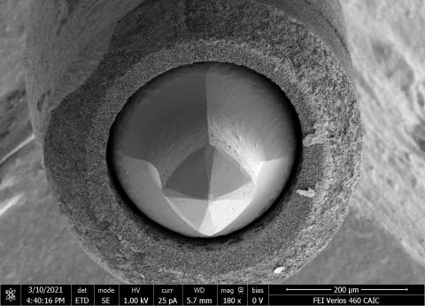 Lanthanum hexaboride (LaB6) cathode (Kimball Physics Inc.) after about 2 ½ years use as the electron source in the CAIC Tecnai TEM. The LaB6 crystal at the centre is held in place by a carbon ferrule (round, surrounding structure) and shows shortening and